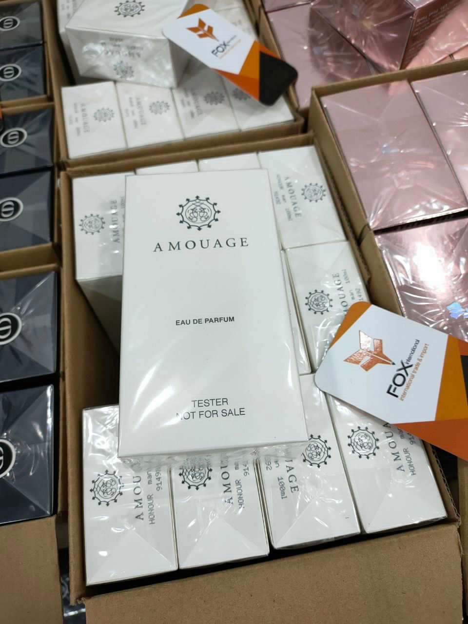 Assorted perfumes Assorted perfume pallet of mixed fragrance bottles and gift sets arranged for shipping from Save More Liquidations
