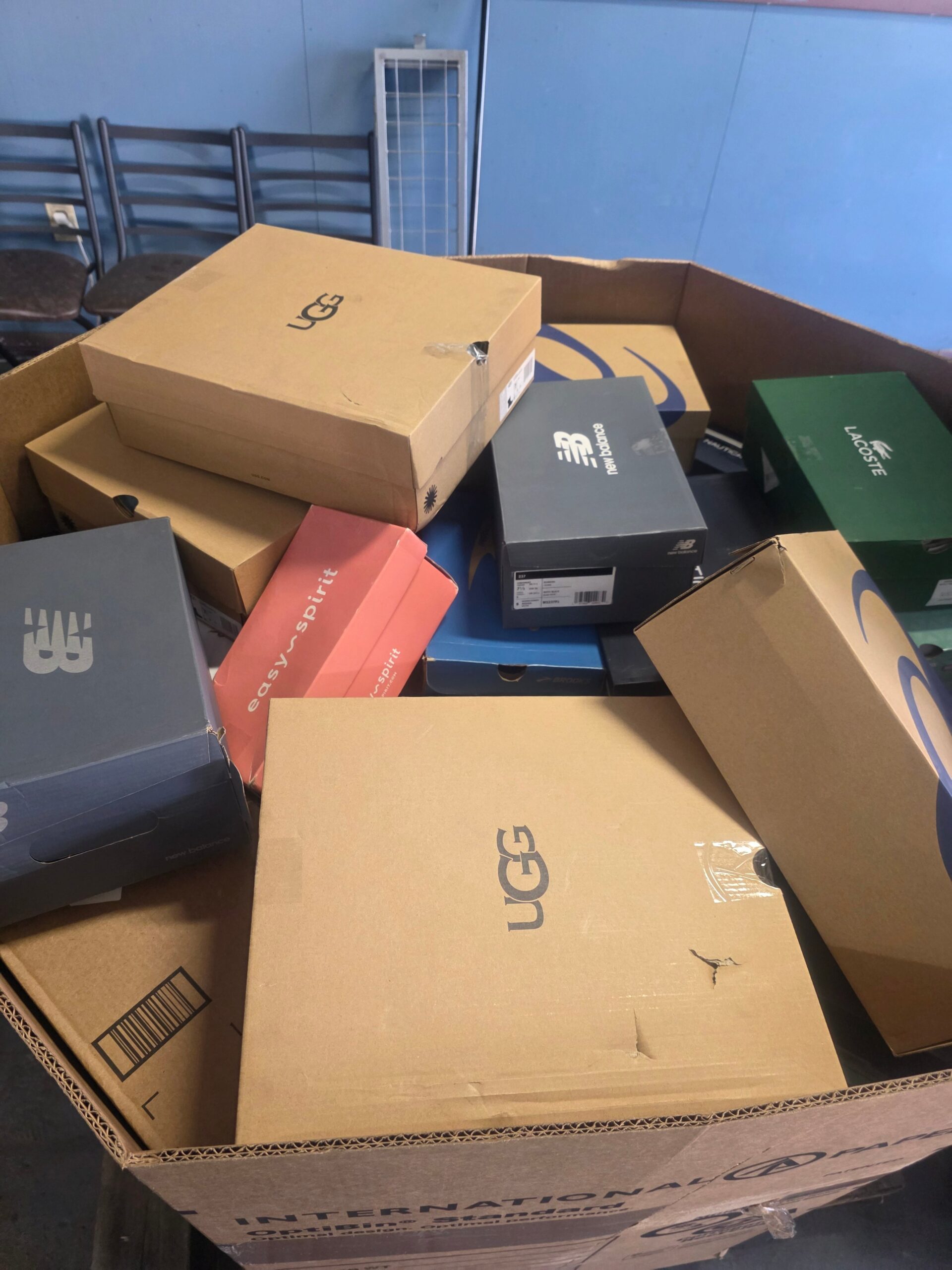 Boxed Shoes (100 pair) Mixed shoes pallet — 110-pair pallet of mixed-brand shoes including athletic, casual, dress, sandals, boots from Sketchers, Vans, Crocs, Steve Madden, Nike, Adidas