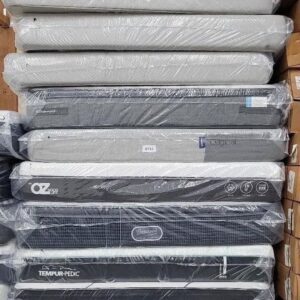 Mattress and foundation pallet of beds and box foundations wrapped for shipping from Save More Liquidations