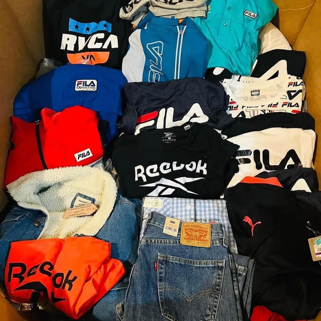 Menβs Winter and Sportswear Multi-Brand Pallet Mens sportswear pallet of 850 multi-brand winter and athletic apparel pieces wrapped for shipping from Save More Liquidations