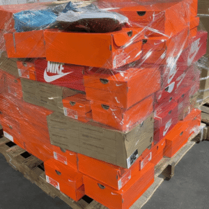 Nike sneaker pallet — 130 pairs of authentic Nike sneakers in original sealed boxes, mixed sizes for men and women on a stretch-wrapped pallet