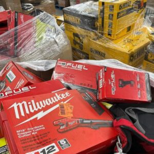 Tool pallets of mixed hand and power tools stacked for shipping from Save More Liquidations