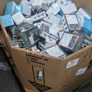 Mixed electronics pallet of high-retail consumer electronics wrapped for shipping from Save More Liquidations