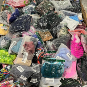 Amazon LPN mixed apparel pallet — wrapped pallet of LPN-sourced Amazon apparel inventory mixing men's and women's clothing, including bathing suits, all pieces individually packaged ready for resale