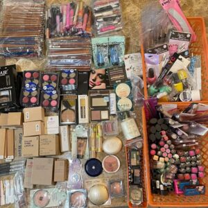 Cosmetic pallet of assorted makeup, skincare and haircare arranged for shipping from Save More Liquidations