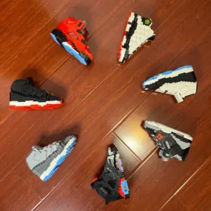 Sneakers liquidation pallet — 60 to 80 pairs of mixed-brand authentic sneaker inventory including Nike, Adidas, Puma, New Balance, Vans, and Converse
