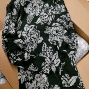 Free People clothing pallet of boho womens fashion folded for shipping from Save More Liquidations