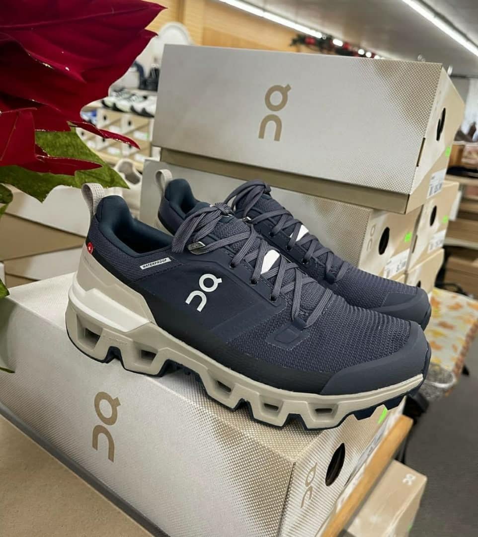 Cloud nova shoe pallets. Cloud Nova shoe pallet of running and athletic sneakers stacked for shipping from Save More Liquidations