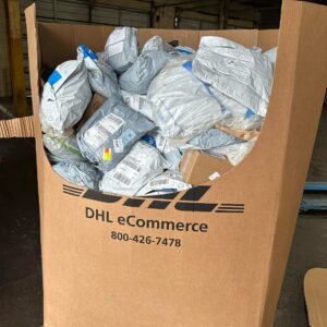 Unclaimed mail truckload — 24 premium pallets of US carrier-recovered unclaimed mail weighted to UPS/FedEx residential parcel recovery for premium mystery-box resellers