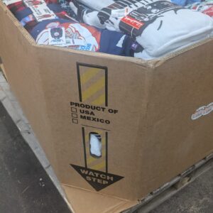 BJs clothing pallet of Christmas and holiday apparel folded for shipping from Save More Liquidations