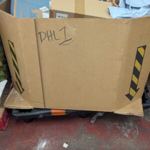 DHL clothing pallet of overstock and returned-parcel apparel wrapped for shipping from Save More Liquidations