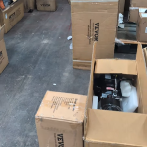 VEVOR pallet of unboxed tools and equipment stacked for shipping from Save More Liquidations
