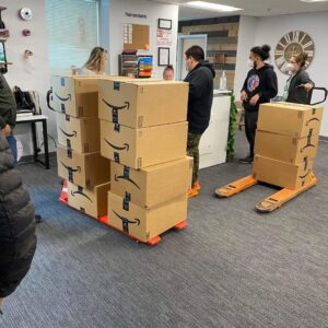 Electronics mystery boxes — 20 sealed mystery boxes of electronics accessories including phone cases, chargers, earbuds, wireless audio, computer accessories, and power/charging