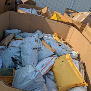 USPS unclaimed mail 8 foot pallet — 20-box tall pallet of USPS-specific first-class, Priority Mail, and Media Mail unclaimed parcel recovery