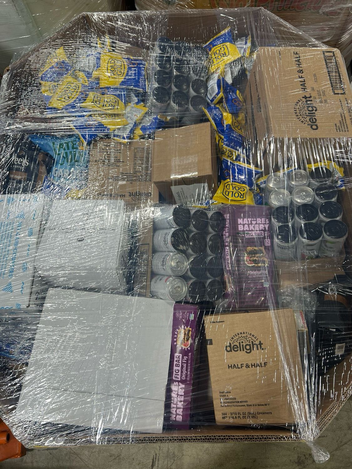 amazon-food-pallet-amzf-3408-pallet-liquidation-depot-1.jpg Amazon food pallet AMZF-4 — wrapped pallet of mixed Amazon food and beverage items packaged for flea market booth bundle resale