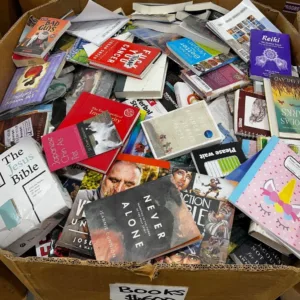 Books liquidation pallet of assorted titles wrapped for shipping from Save More Liquidations