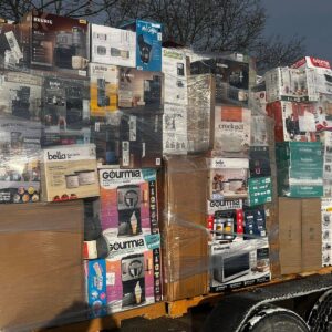 Costco return pallet — wrapped pallet of mixed-category Costco customer returns including household, kitchen, electronics, and general merchandise SKUs