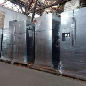 Refrigerators pallet of fridges and coolers wrapped for shipping from Save More Liquidations