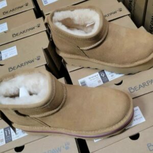 Ugg shoes pallet of 150 pairs of boots and footwear stacked for shipping from Save More Liquidations