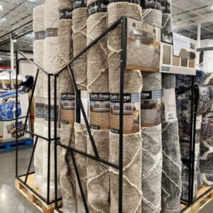 Rugs liquidation pallet of assorted area rugs and carpet stacked for shipping from Save More Liquidations