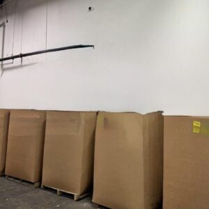 Amazon HPC pallet — high piece count wrapped pallet of Amazon returns merchandise with dense SKU loading across mixed general merchandise categories