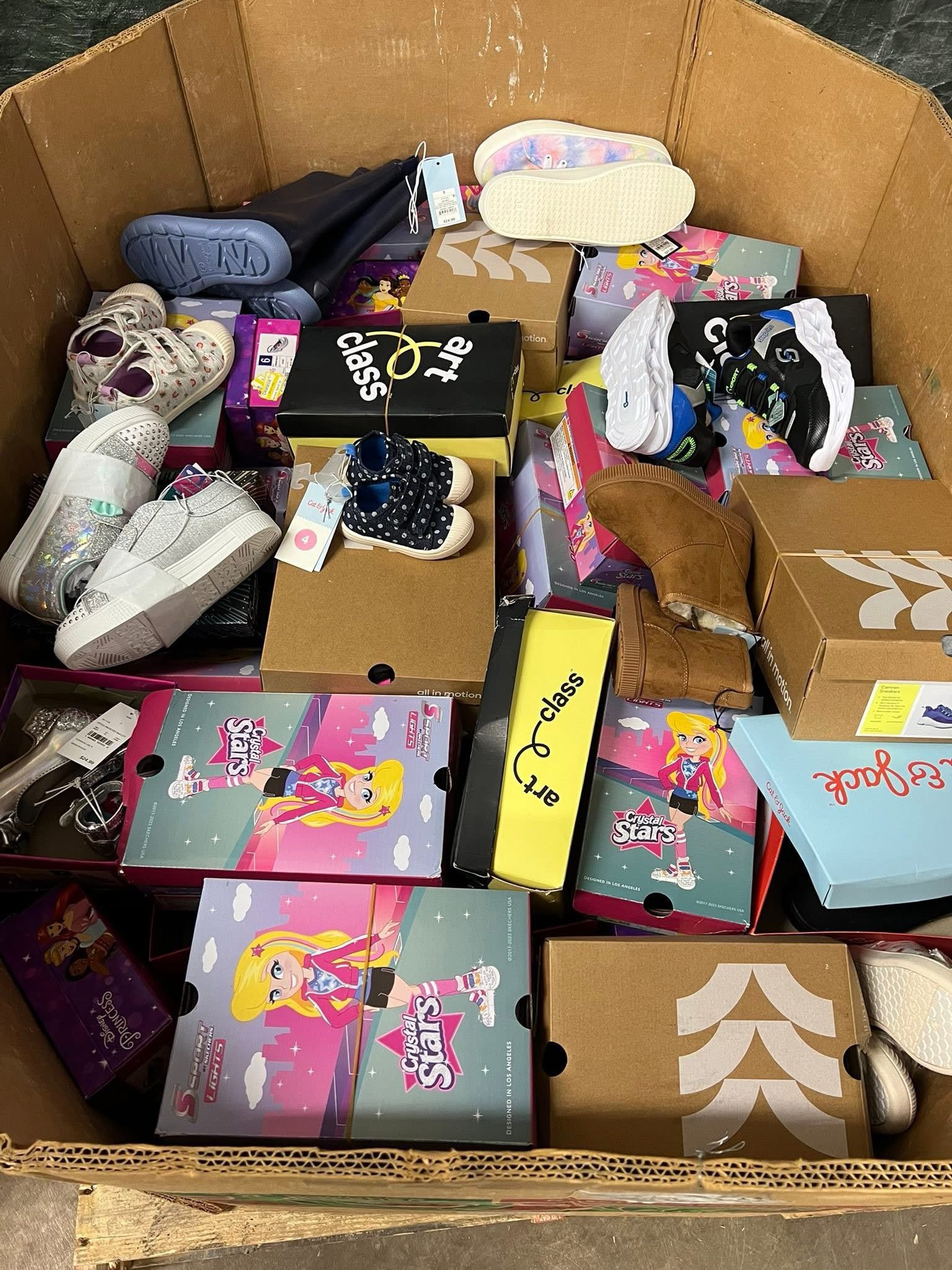 img_2026.jpeg Target kids shoes pallet — wrapped pallet of 300 pairs of Target kids shoes in spring and summer styles including sneakers, sandals, and flip flops, 95% brand new condition