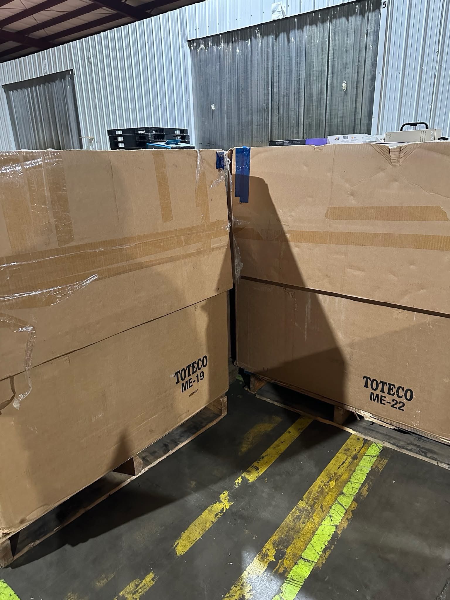 img_2347.jpeg Amazon electronics pallet — wrapped pallet of LPN-labeled high-end Amazon electronics returns including small electronics, audio gear, accessories, and smart home devices