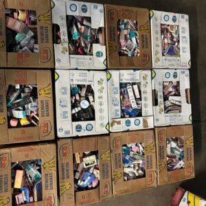 Makeup liquidation pallet — single pallet of mixed-brand cosmetics makeup overstock including foundation, eye makeup, lip products, cheek products, and tools