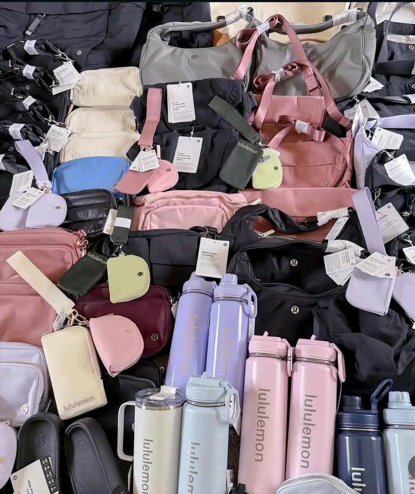 lululemon-makeup-bag-buy-wholesale-lululemon-bags.jpg Lululemon makeup bag wholesale bundle — 75 authentic Lululemon cosmetic bags and 40+ Lululemon accessories stacked for shipping