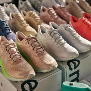 Lululemon shoes pallet — 500 pairs of authentic Lululemon athletic footwear in mixed sizes and colors on a stretch-wrapped pallet