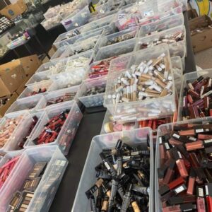 Jaclyn Cosmetics pallet of liquidation makeup wrapped for shipping from Save More Liquidations