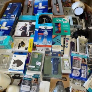 Wholesale electronics lot of audio, accessories and small devices shrink-wrapped for shipping from Save More Liquidations