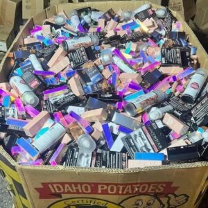 Laura Geller makeup pallet of liquidation cosmetics wrapped for shipping from Save More Liquidations