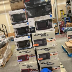 Microwave pallet of countertop microwave ovens stacked for shipping from Save More Liquidations