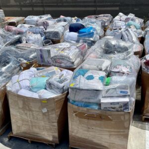 Wholesale bedding pallet of sheets, comforters and home textiles folded for shipping from Save More Liquidations