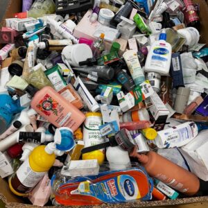 Liquidation cosmetics pallet of assorted beauty products arranged for shipping from Save More Liquidations