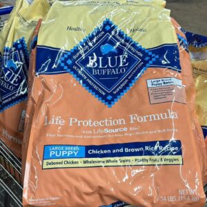 Dog food pallets for sale holding 50 bags and cases of bulk dog food shrink-wrapped for shipping from Save More Liquidations