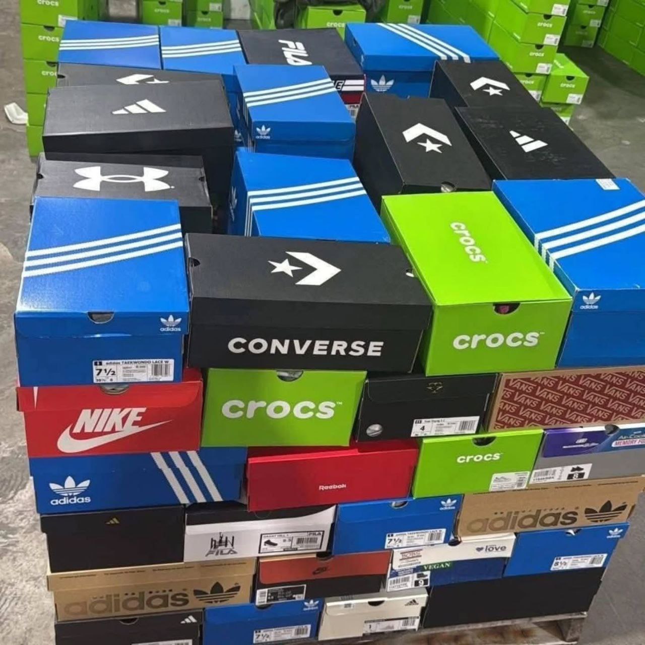 200 UNITS – Mixed Shoes Pallet (Wholesale Lot) Mixed shoes pallet of 200 pairs of assorted footwear stacked for shipping from Save More Liquidations