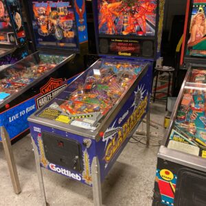Used pinball machine liquidation arcade games wrapped for shipping from Save More Liquidations