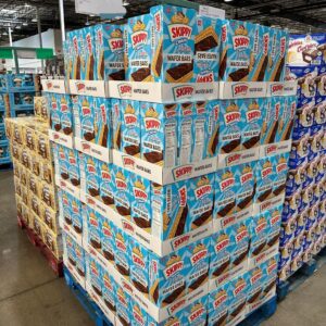 Snacks liquidation pallet of chips candy and shelf-stable snacks wrapped for shipping from Save More Liquidations