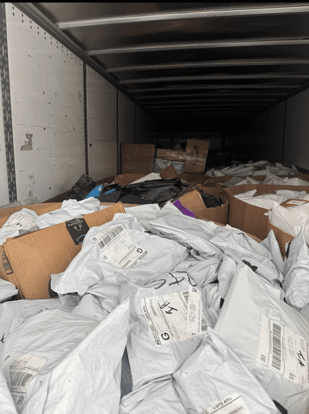 undeliverable_main-K7qGVtru.png Premium undeliverable HPC pallet — single high-piece-count pallet of premium-tier undeliverable parcel recovery with UPS and FedEx residential weighting