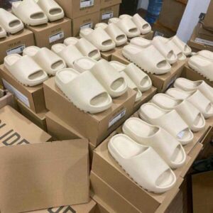 Yeezy slides pallet sold as-is wrapped for shipping from Save More Liquidations