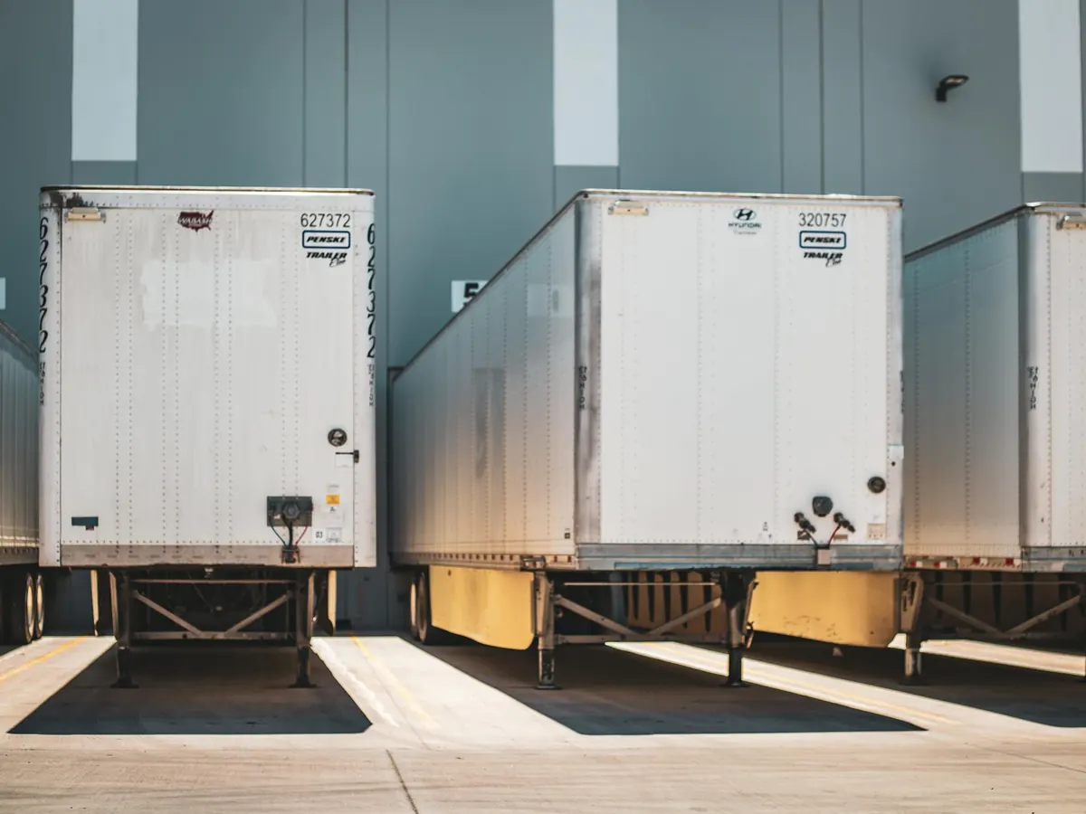 Freight trailers backed up at SaveMore loading dock for truckload shipments