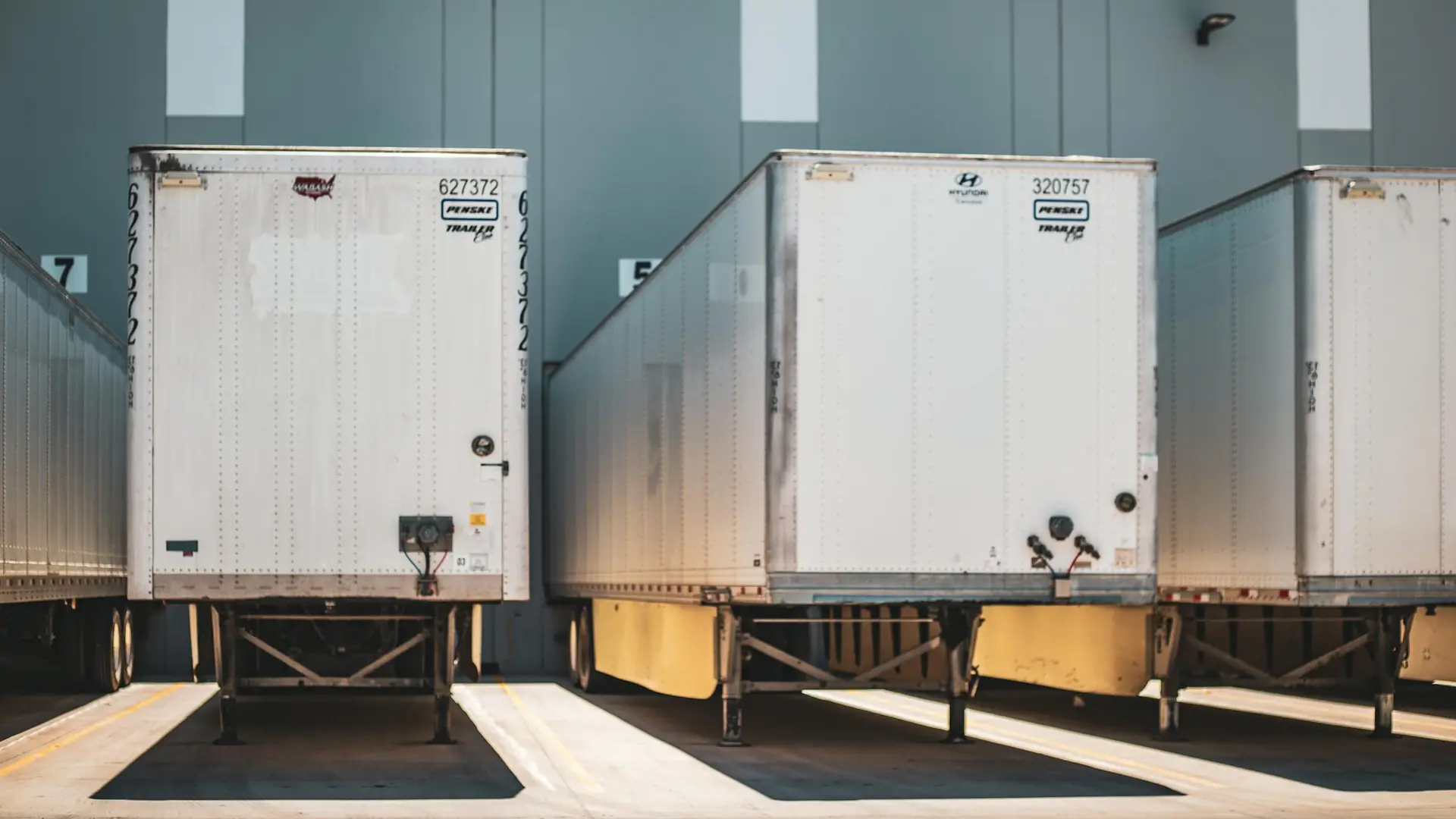 Row of freight trailers at SaveMore commercial loading dock